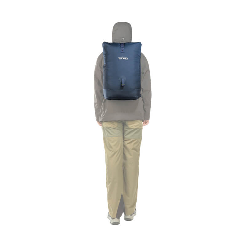 Back view of person carrying the thirty-four litre Tatonka roll top bag - Navy / Dark Blue