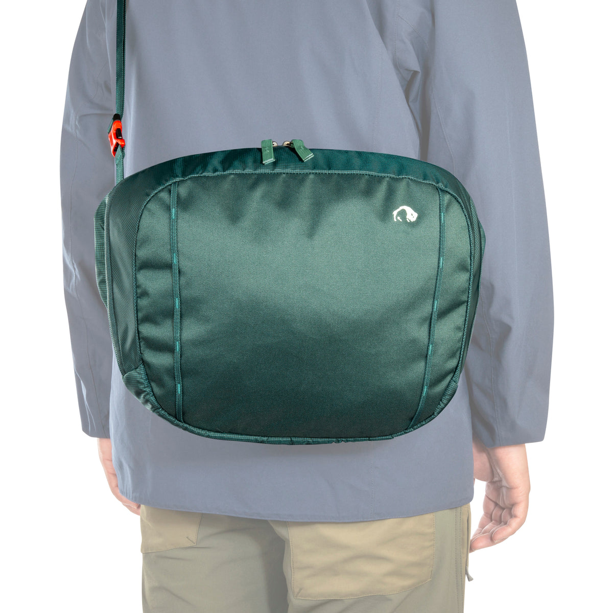Removable lid from 70/10 litre Tatonka branded Yukon pack shown being used as shoulder bag with the included straps - Jasper