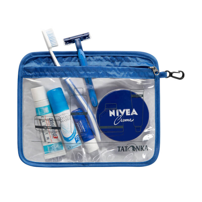 Front view of the transparent Tatonka branded Zip Flight Bag with zip closure and practical hanging clip hook. Shown unzipped with toiletries inside. Measures 22 by 18 cm – Clear with blue binding