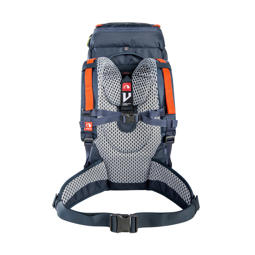 Back view of 32 litre Tatonka branded Yukon 32 JR pack with V Comfort Vario carrying system including length-adjustable for body sizes from age 8 through to smaller adults, padded hip belt for proper weight transfer, carrying handle, single-handed hip belt adjustment through redirected fixation design and height-adjustable chest strap – Navy with Orange highlights