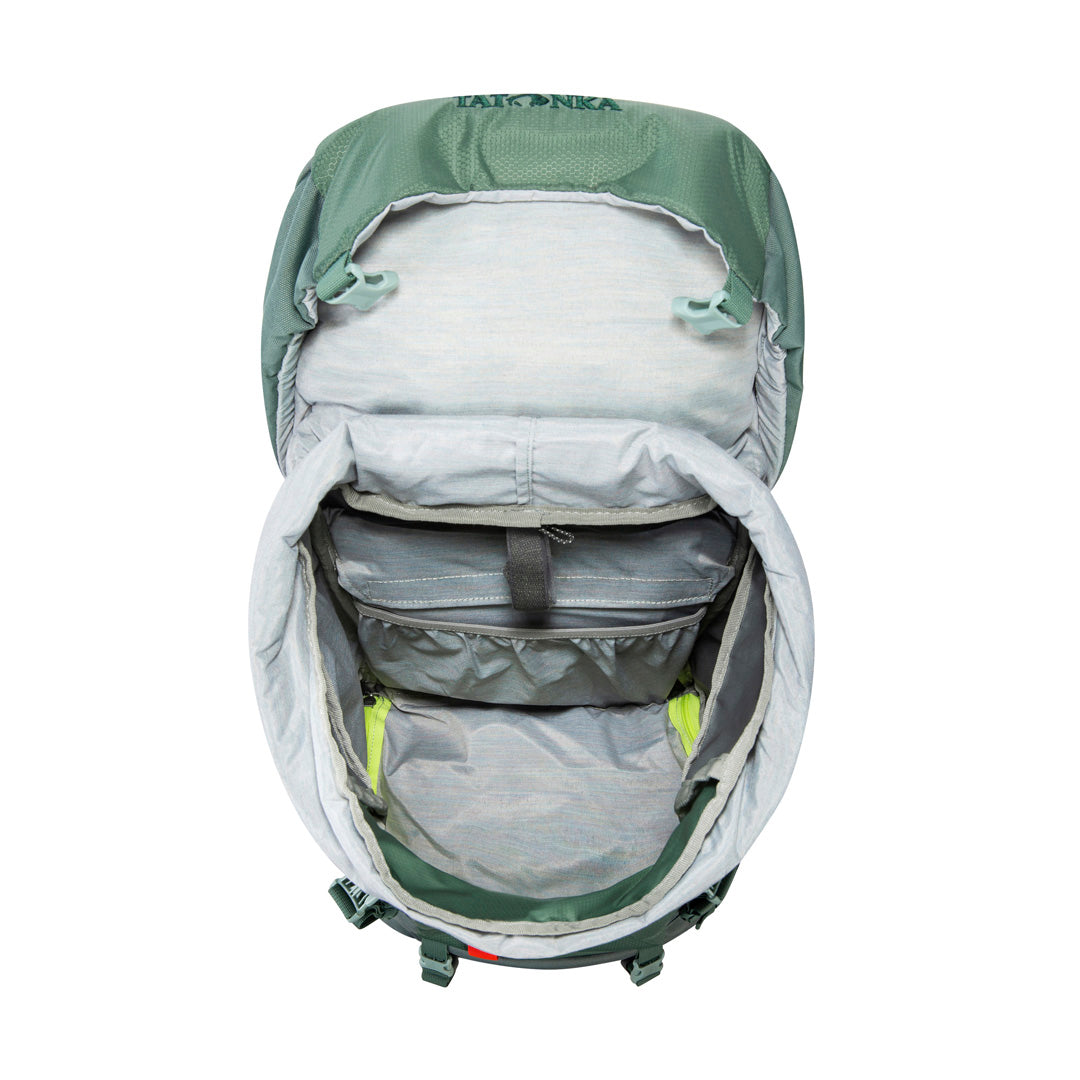 Overhead view of 32 litre Tatonka branded Yukon 32 JR pack showing main compartment plus pouch to hold hydration system - Sage Green