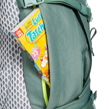 Close up of zippered side pocket on 32 litre Tatonka branded Yukon 32 JR pack – Sage Green